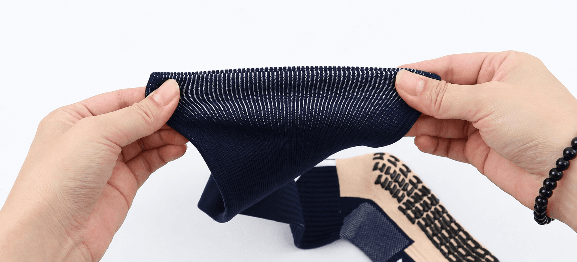 Stretch test of a football sock cuff and leg