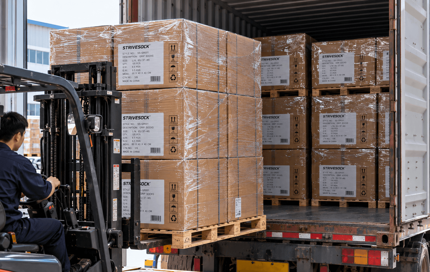 Cartons of football socks being loaded for a bulk order