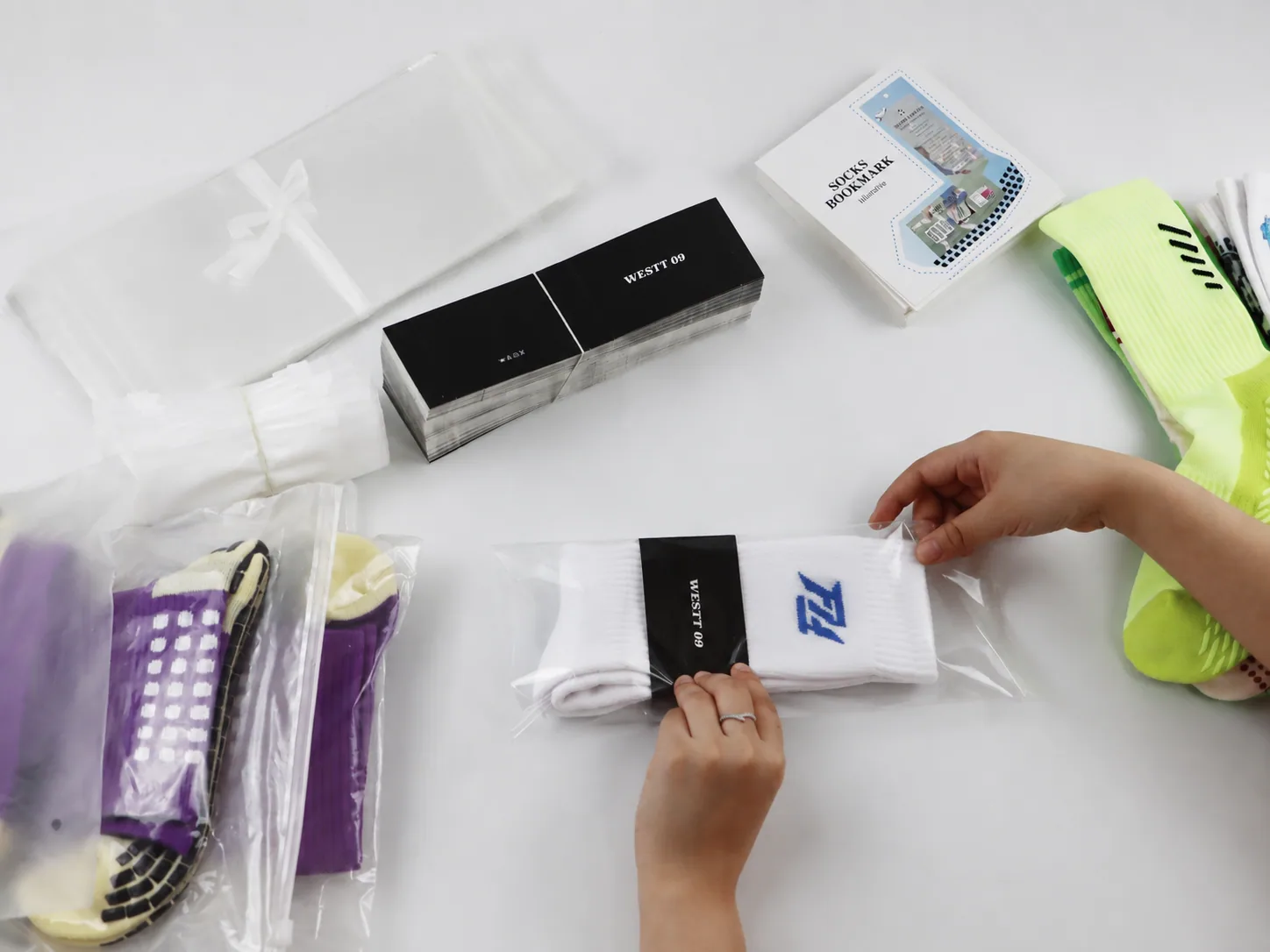 Private label custom socks being prepared with retail packaging