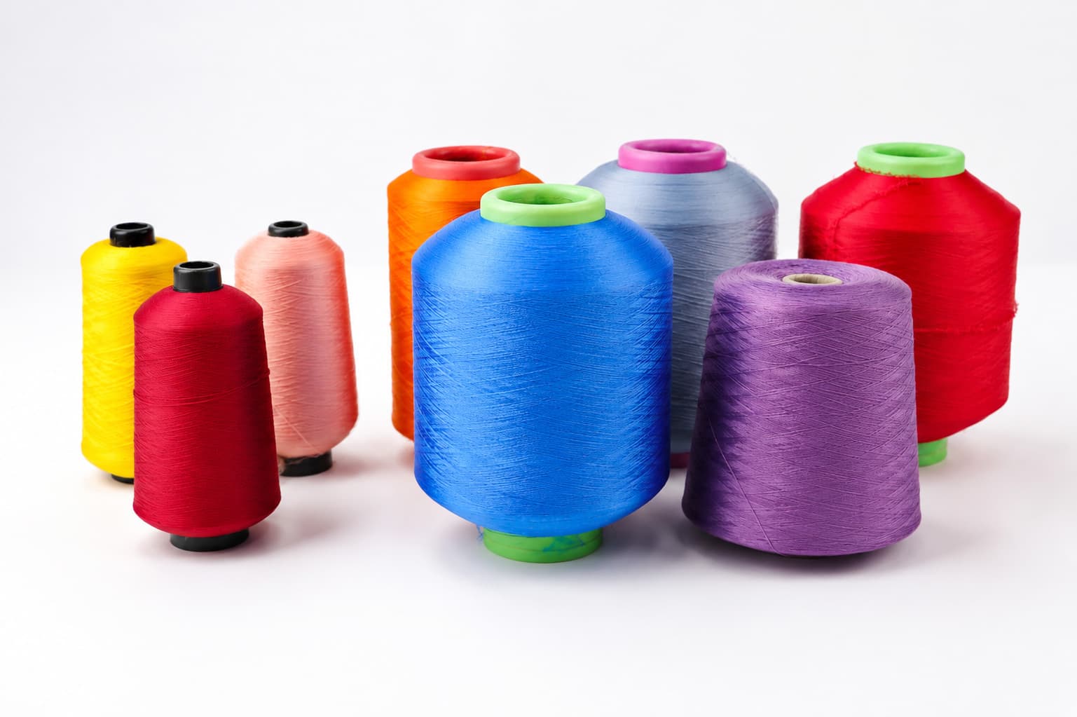 Colorful yarn cones prepared for custom socks material and color selection