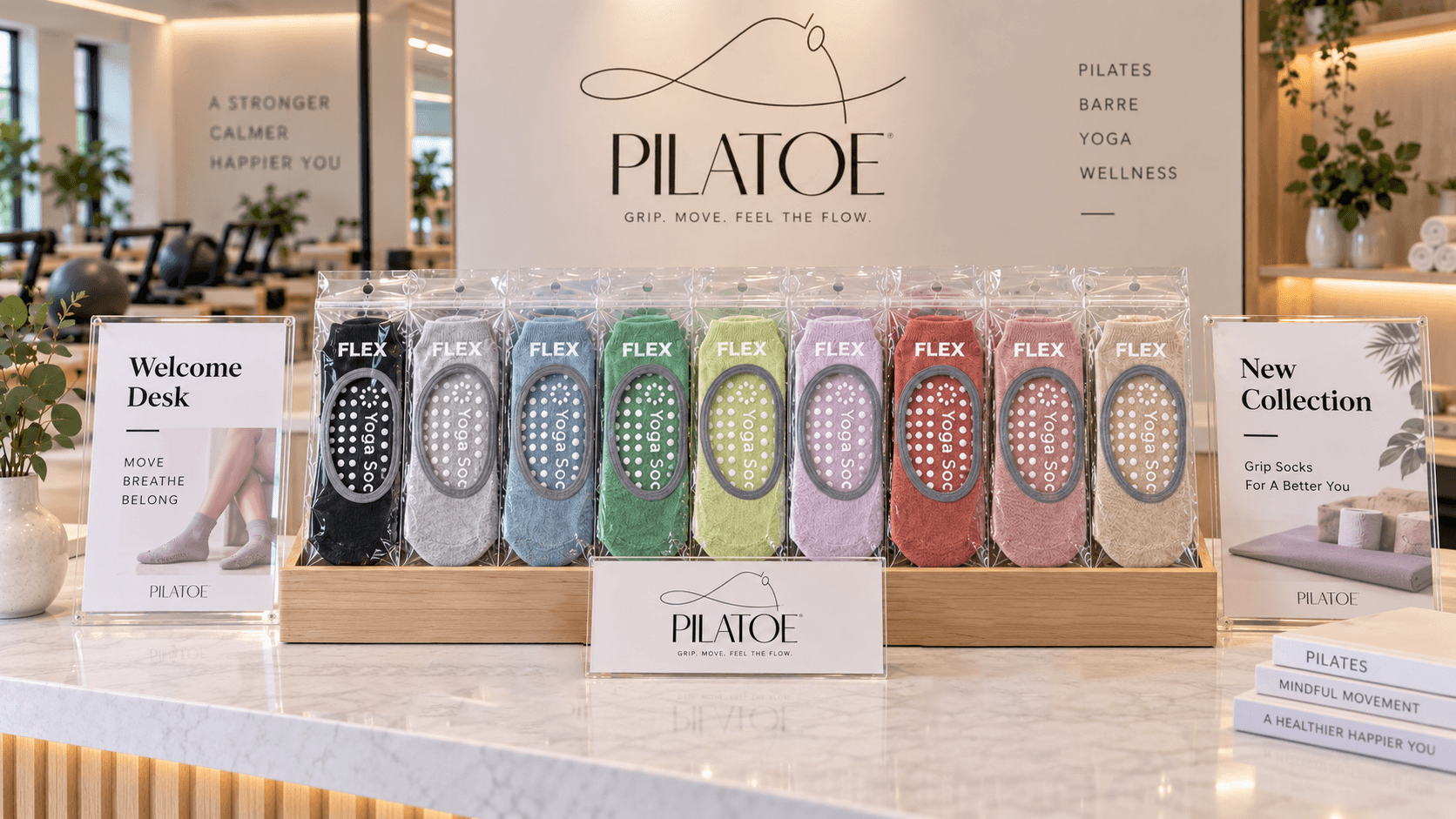 Pilates grip socks displayed as a studio retail product