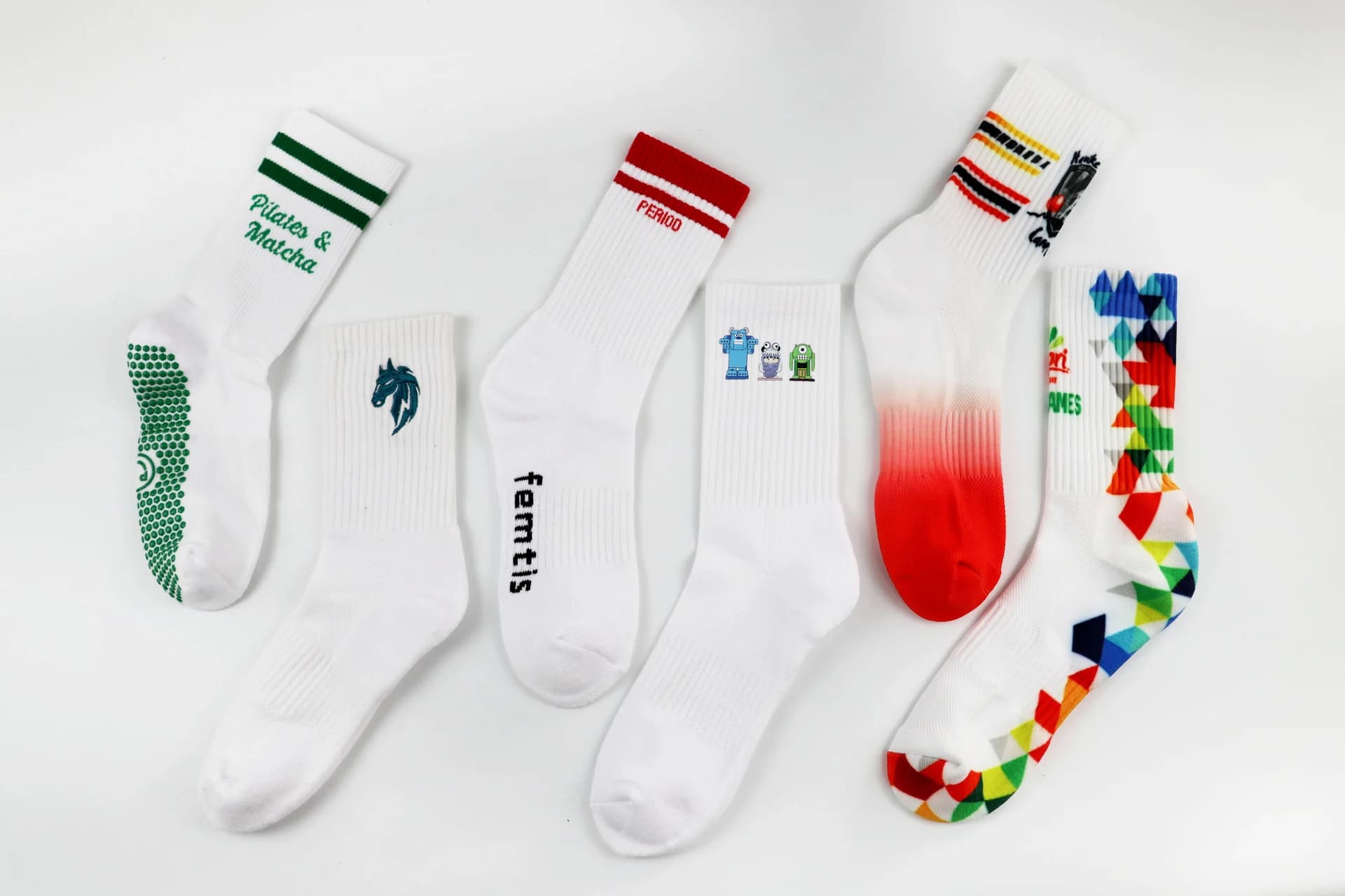 Private label sock samples showing custom logo placement and grip sole options
