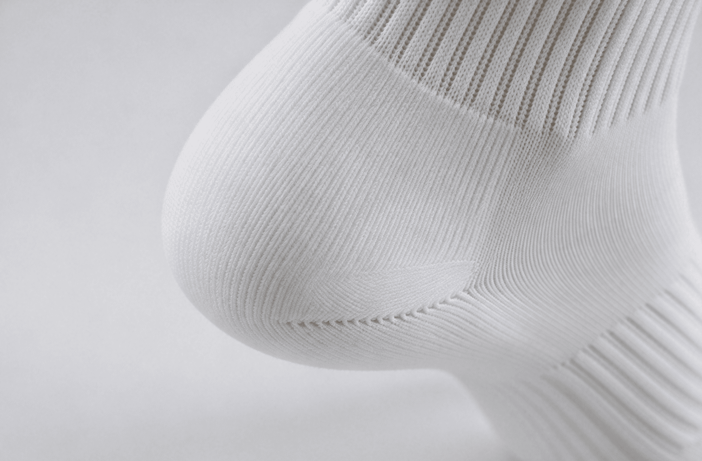 Close-up of a reinforced running sock heel