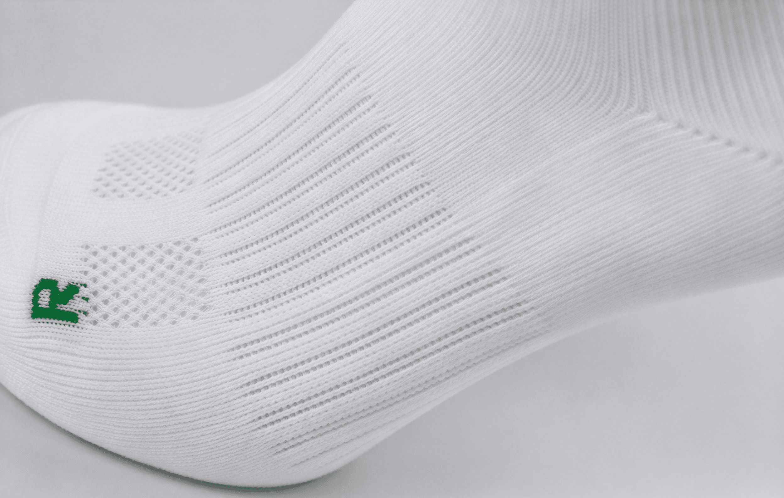 Close-up of an elastic support zone in a performance running sock