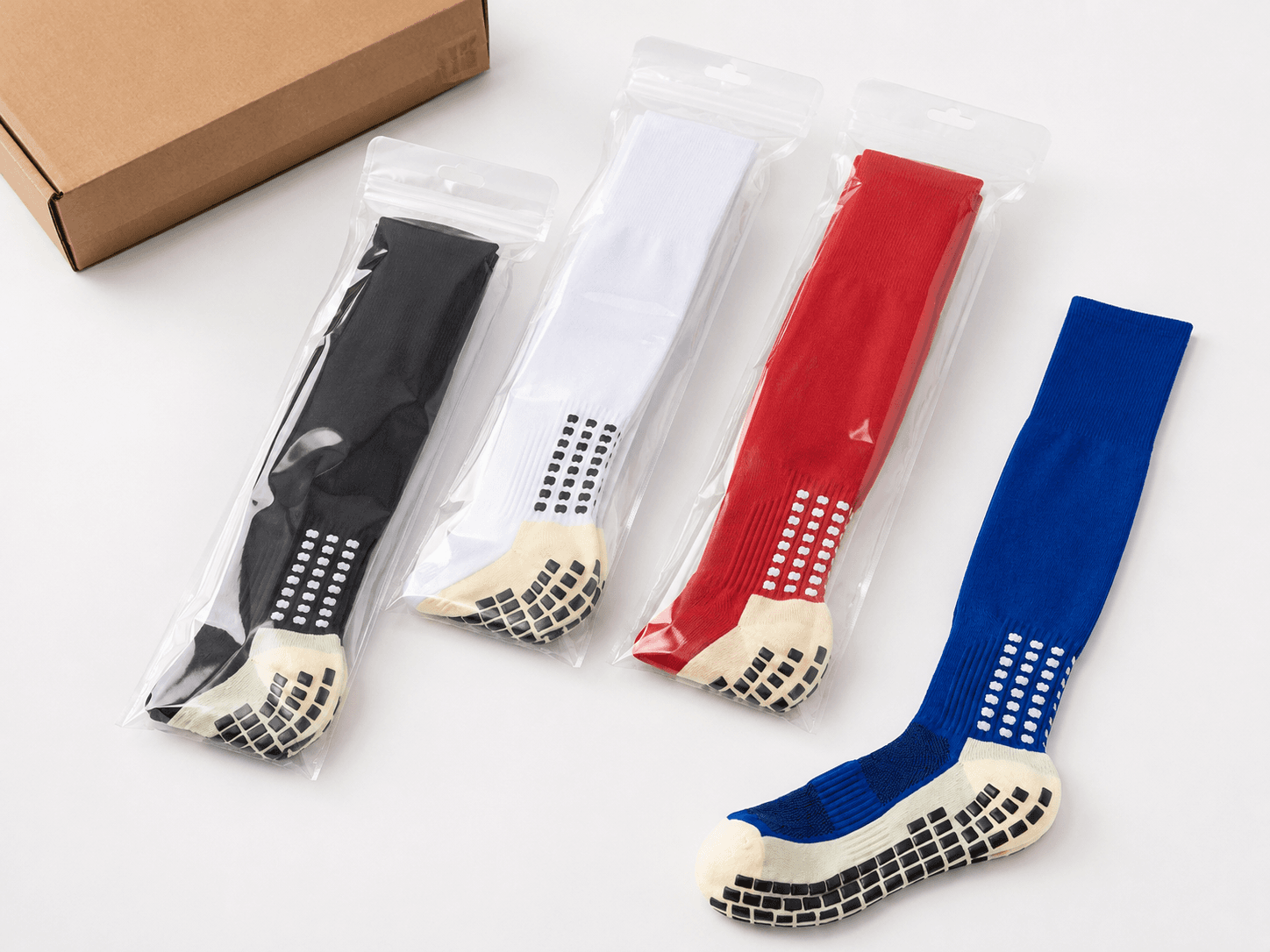 Football socks sorted in individual team packaging