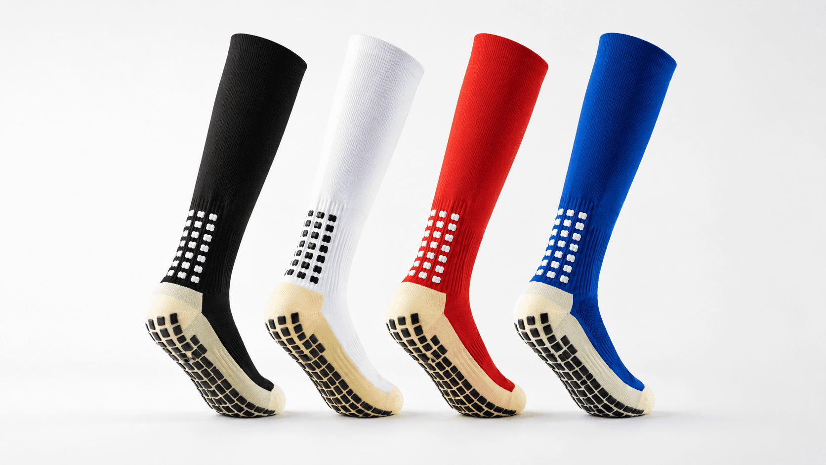 Four custom football grip sock colorways