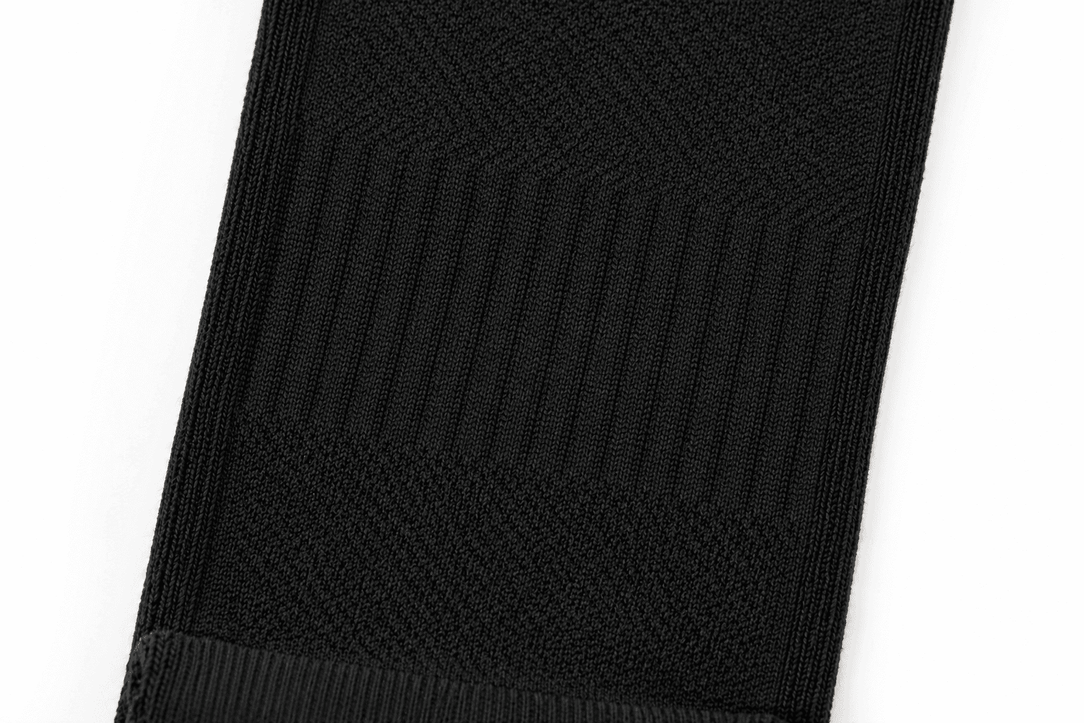 Close-up black Pilates sock knit and support zones