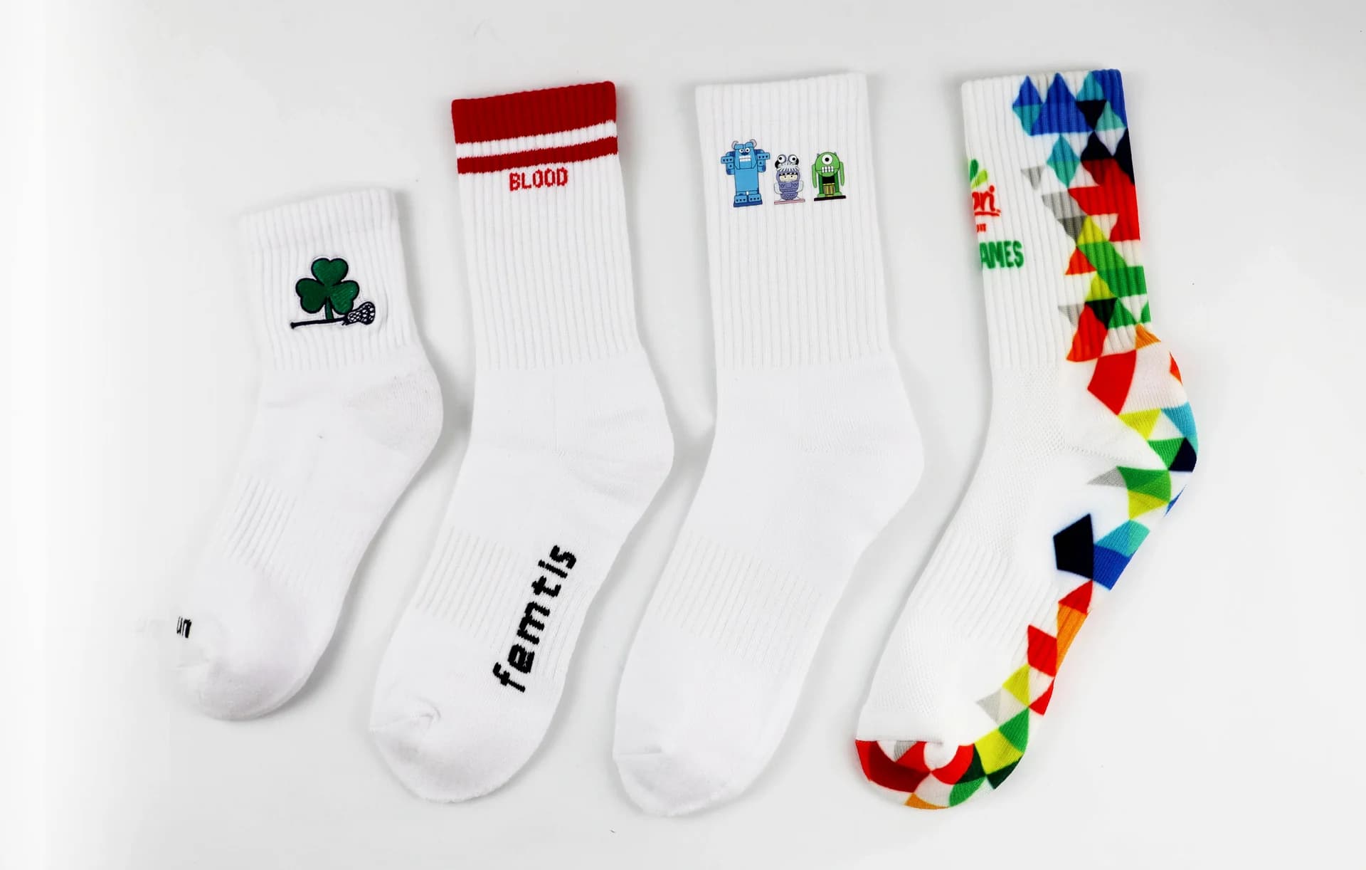 Different custom white sock styles with knitted logos and full-color patterns