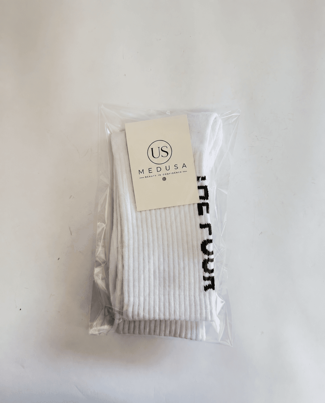 Detailed finished sock view showing the approved logo and construction