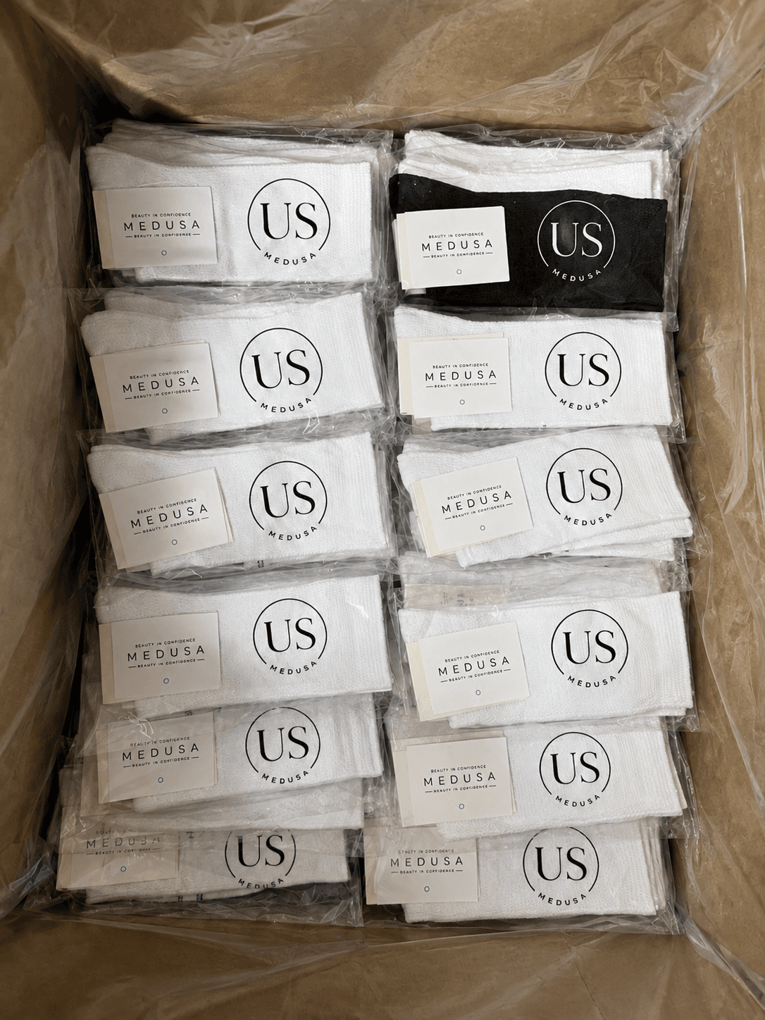 Completed private label socks packed with branded retail cards