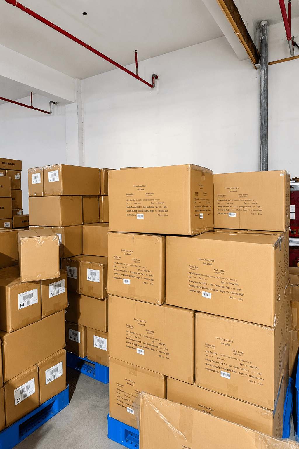 Labeled cartons grouped in the factory dispatch area