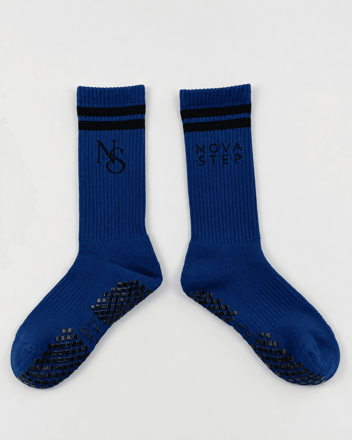 Blue custom grip sock size sample showing knit structure and sole grip placement